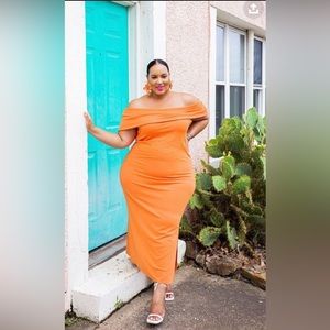 Orange / Tangerine bodycon off shoulder sleeveless dress.